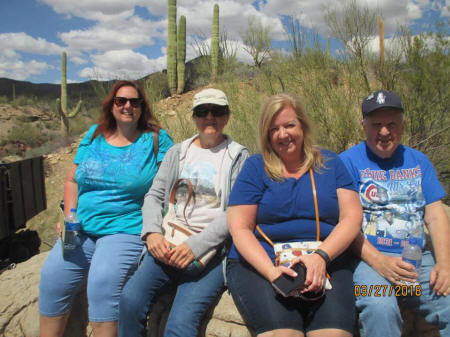 Image may contain: 4 people, including Kathie Lopatka Spillman and Greg Lopatka, people smiling, sky, tree, outdoor and nature